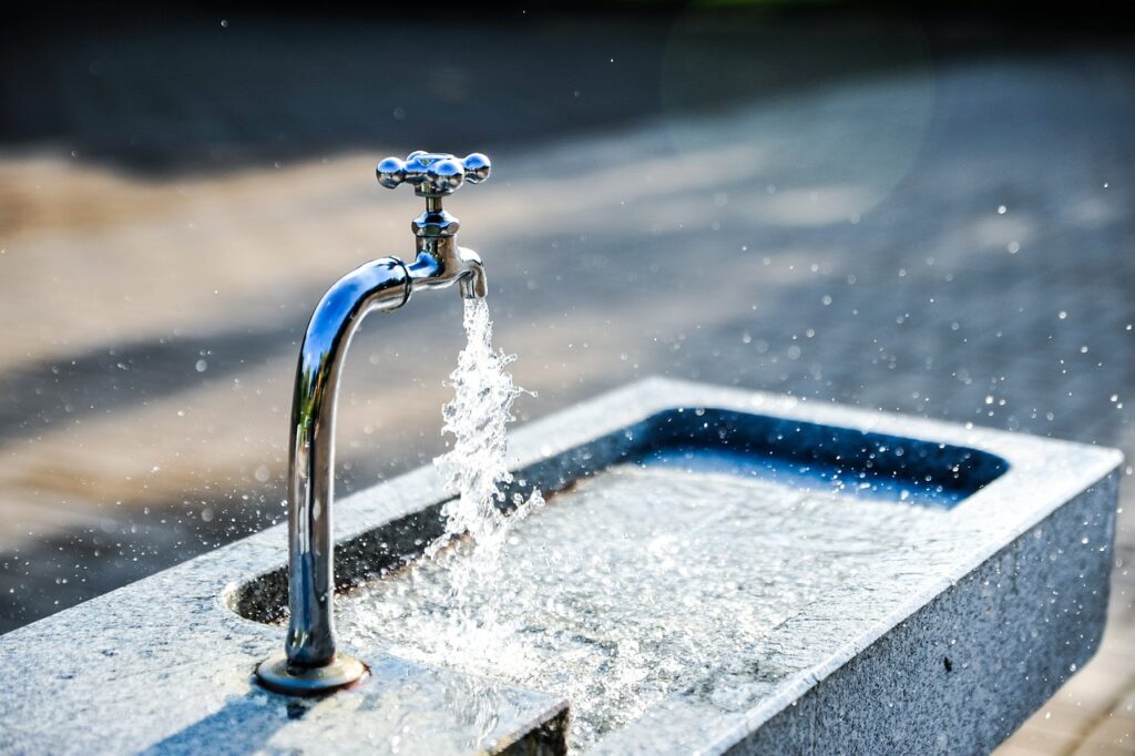 Running tap water representing Port Clinton Water Co-Op service