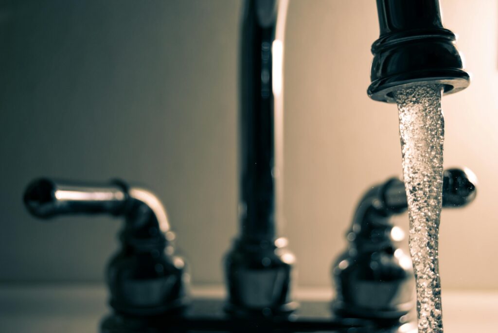 Water flowing out of a facuet